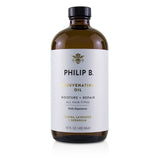 Philip B Rejuvenating Oil in a 480ml bottle, designed to moisturize, repair, and enhance all hair types.