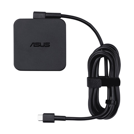 ASUS 65W Type-C charger with power cord, compact design ensuring reliable charging for ASUS laptops at home or on the go.