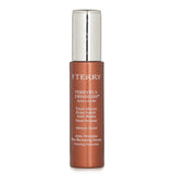 By Terry Terrybly Densiliss Sun Glow Serum in #1 Sun Fair, a bronzing serum that smooths, tightens, and adds youthful radiance.