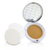 Bliss Em'powder' Me Buildable Powder Foundation in #Bronze, showcasing silky texture and customizable sheer coverage.