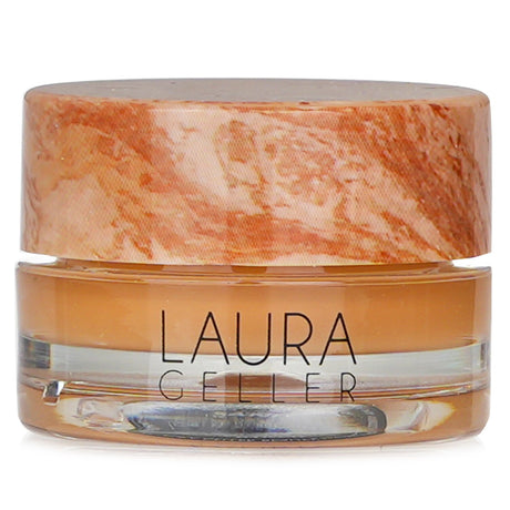 Laura Geller Baked Radiance Cream Concealer in #Sand, a creamy, lightweight formula that blurs imperfections for a flawless finish.