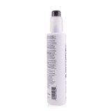 Paul Mitchell Soft Style Quick Slip in a 200ml bottle for effortless styling, flexible hold, and sun protection for healthy hair.