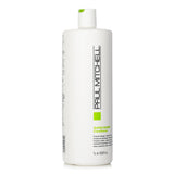 Paul Mitchell Super Skinny Conditioner bottle - 1000ml, designed to soften and protect hair while preventing damage and frizz.