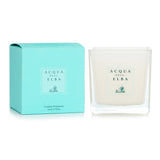 Luxurious scented candle in Isola D'Elba, 180g, offering up to 60 hours of soothing Mediterranean fragrance for any space.