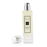 Jo Malone Honeysuckle & Davana Cologne Spray in 30ml, a floral fragrance with sweet honeysuckle and fruity davana notes.