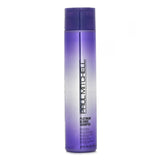 Violet-tinted shampoo designed to reduce brassiness and enhance shine for radiant blonde, white, or silver hair.