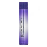 Paul Mitchell Platinum Blonde Shampoo in a violet-tinted bottle, ideal for cooling brassiness and enhancing shine in blonde hair.