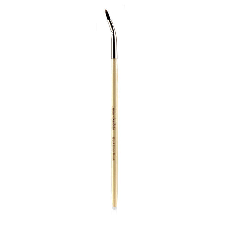 Angled rose gold eyeliner brush with soft bristles for precise application of gel liners and dramatic eye looks.