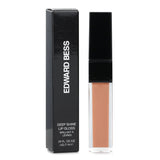 "Edward Bess Deep Shine Lip Gloss in #Nude Whisper offers vibrant color and moisture for a satiny, seductive pout."