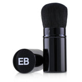 Retractable makeup brush by Edward Bess for flawless application and easy on-the-go touch-ups, featuring fine bristles.