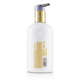 Molton Brown - Mesmerising Oudh Accord & Gold Body Lotion  - 300ml/10oz