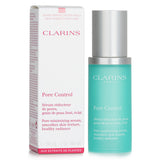 Clarins Pore Control Serum in a 30ml bottle, minimizing pores, refining skin texture, and enhancing radiance with natural extracts.