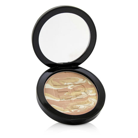 Edward Bess Marbleized Rose Gold Highlighting Powder in a compact, showcasing a blend of three hues for a luminous glow.