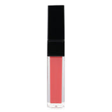 Edward Bess Deep Shine Lip Gloss in #26 Lover's Desire offers vibrant color and moisturizing shine for a seductive pout.