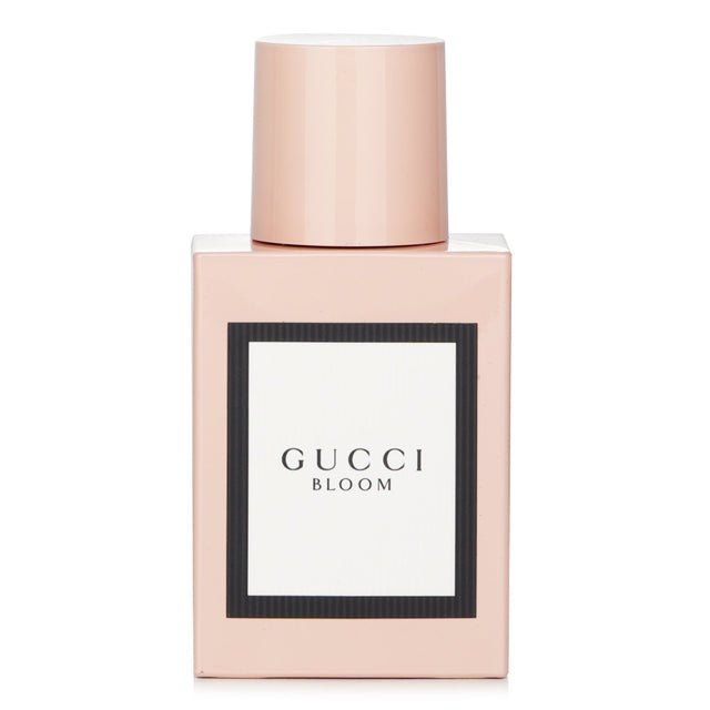 Gucci Bloom Eau De Parfum Spray 30ml: A floral fragrance with orange, tuberose, and vanilla notes, perfect for elegant women.