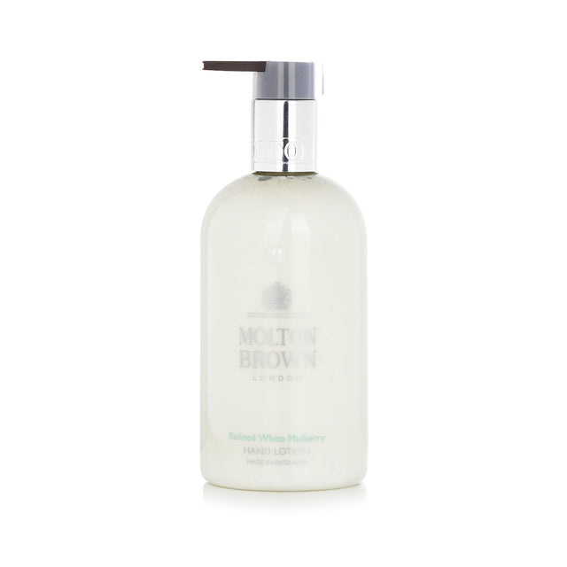 Molton Brown Refined White Mulberry Hand Lotion in a 300ml bottle, features clary sage, basil, and bergamot for hydrating luxury.