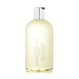 Luxurious Molton Brown Orange & Bergamot Shower Gel in a 300ml bottle, offering refreshing citrus scent and gentle hydration.