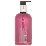 Luxurious Molton Brown hand wash in 300ml, infused with fiery pink pepper for a soft, fragrant cleansing experience.