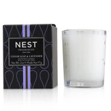 Scented candle featuring cedar leaf and lavender, creating a calming ambience for up to 20 hours. Perfect for relaxation.
