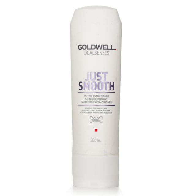 Goldwell Just Smooth Taming Conditioner for unruly hair, enriched with Kukui Nut Oil for sleek, manageable, and vibrant locks.