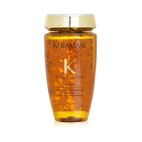 Kerastase Elixir Ultime shampoo revitalizes dull hair, enhancing shine and silkiness with lightweight, nourishing oils.