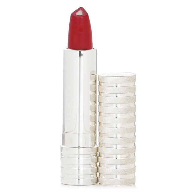 Luxurious Clinique lipstick in #20 Red Alert, offering rich hydration and vibrant color with 3D Pearl technology for fuller lips.