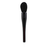 Shiseido Maru Fude Multi Face Brush featuring synthetic bristles for flawless makeup application and ergonomic design for control.