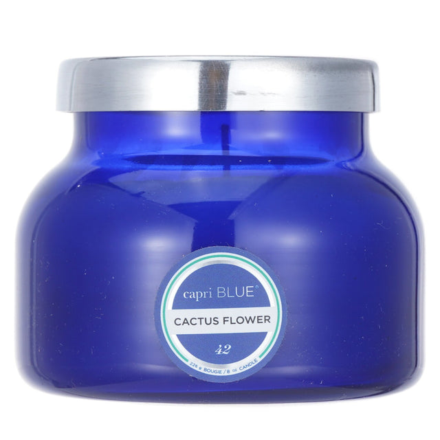 Capri Blue blue jar candle in Cactus Flower scent, featuring peony and peach fragrances, elegant design, burns for 25 hours.
