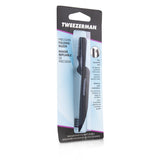 Tweezerman Precision Folding Brow Razor in black with sharp blade, soft-touch handle, and built-in brush for perfect brows.