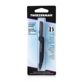 Tweezerman Precision Folding Brow Razor in black, featuring a sharp blade, soft-touch handle, and built-in brush for precise brow shaping.