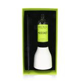 Miller Harris Mossket diffuser in an elegant ceramic pot, featuring five wood reeds for a luxurious home fragrance experience.