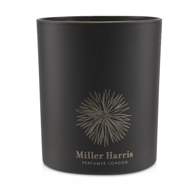 Luxurious Miller Harris L'Art De Fumage candle, 185g, with uplifting citrus scent and 40-hour burn time for a serene atmosphere.