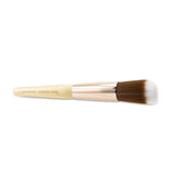 Jane Iredale Blending Brush in rose gold, ideal for seamless blending of powders and creams with a luxurious finish.