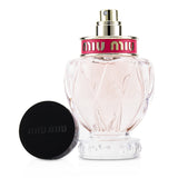 Miu Miu Twist Eau De Parfum Spray in a 30ml bottle, featuring floral woody notes of bergamot, apple blossom, cedarwood, and amber.