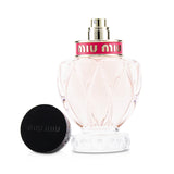 Miu Miu Twist Eau De Parfum Spray 50ml, a fresh floral woody scent with bergamot, apple blossom, cedarwood, and amber.