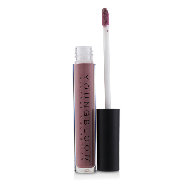 Youngblood Lipgloss in Fantasy adds a luminous hint of color while keeping lips moisturized and free from stickiness.