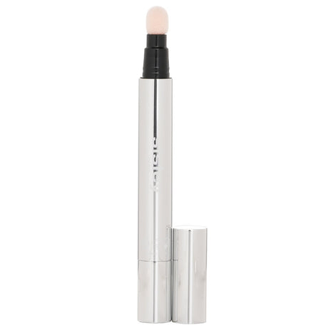 Sisley Stylo Lumiere Instant Radiance Booster Pen #2 Peach Rose, a highlighter pen for a youthful, glowing complexion.