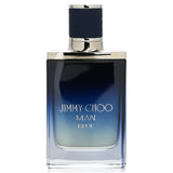 "50ml Jimmy Choo - Man Blue Eau De Toilette featuring a sophisticated woody aromatic scent for modern, dynamic men."