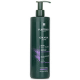 Rene Furterer Okara Silver Radiance Toning Shampoo for vibrant gray and platinum hair, neutralizes brassiness and enhances shine.