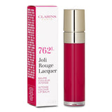 Clarins Joli Rouge Lacquer #762L in Pop Pink offers rich pigment, hydration, and lip protection in a stylish lipstick.