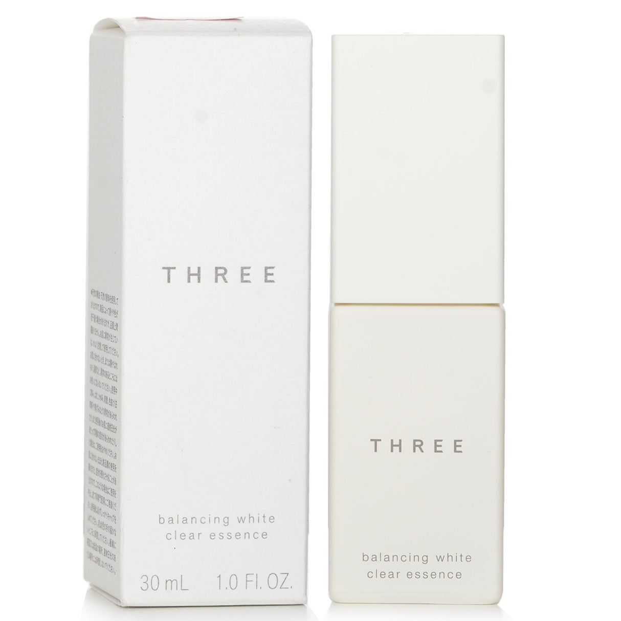 THREE Balancing White Clear Essence in a 30ml bottle, featuring a hydrating formula for an even-toned, radiant complexion.