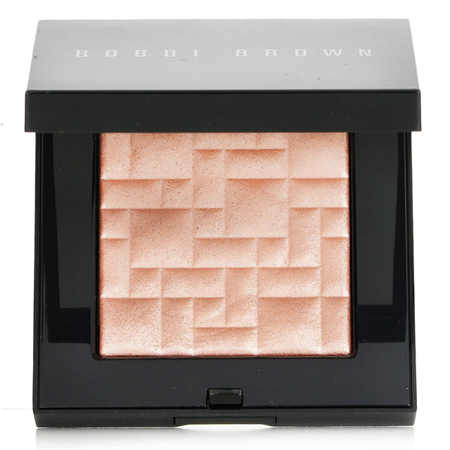 Bobbi Brown Highlighting Powder in Afternoon Glow, a silky, shimmering pink powder for a radiant, luminous complexion.