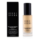 Bobbi Brown Skin Long Wear Weightless Foundation SPF 15 in Warm Ivory, lightweight with full coverage for a natural matte finish.