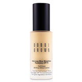 Bobbi Brown Skin Long Wear Foundation SPF 15 in #Warm Ivory, 30ml, offers full coverage with a natural matte finish.