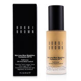 Lightweight Bobbi Brown foundation in #Natural offers buildable coverage, matte finish, SPF 15, and controls oil for all skin types.