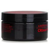 American Crew Men Cream Pomade in a sleek 85g jar, offering light hold, low shine, and frizz control for a polished look.