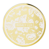 Winky Lux Celestial highlighter, a silky powder for a radiant, natural glow with long-lasting, iridescent finish.