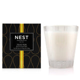 Velvet Pear scented candle in a glass jar, offering a calming aroma and 20-hour burn time for a cozy atmosphere.