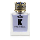 Dolce & Gabbana K Eau De Toilette Spray 50ml, a sophisticated woody aromatic scent for men with citrus and earthy notes.