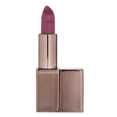 Silky mauve lipstick by Laura Mercier, enriched with pigments for vibrant, lasting color and hydration. Perfect for all skin tones.